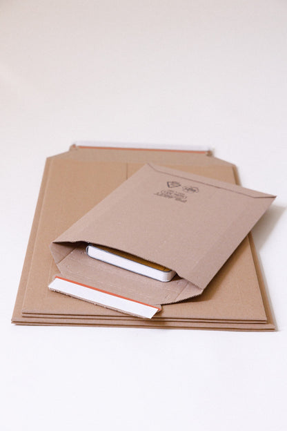 Premium Versandtaschen aus Wellpappe Testliner